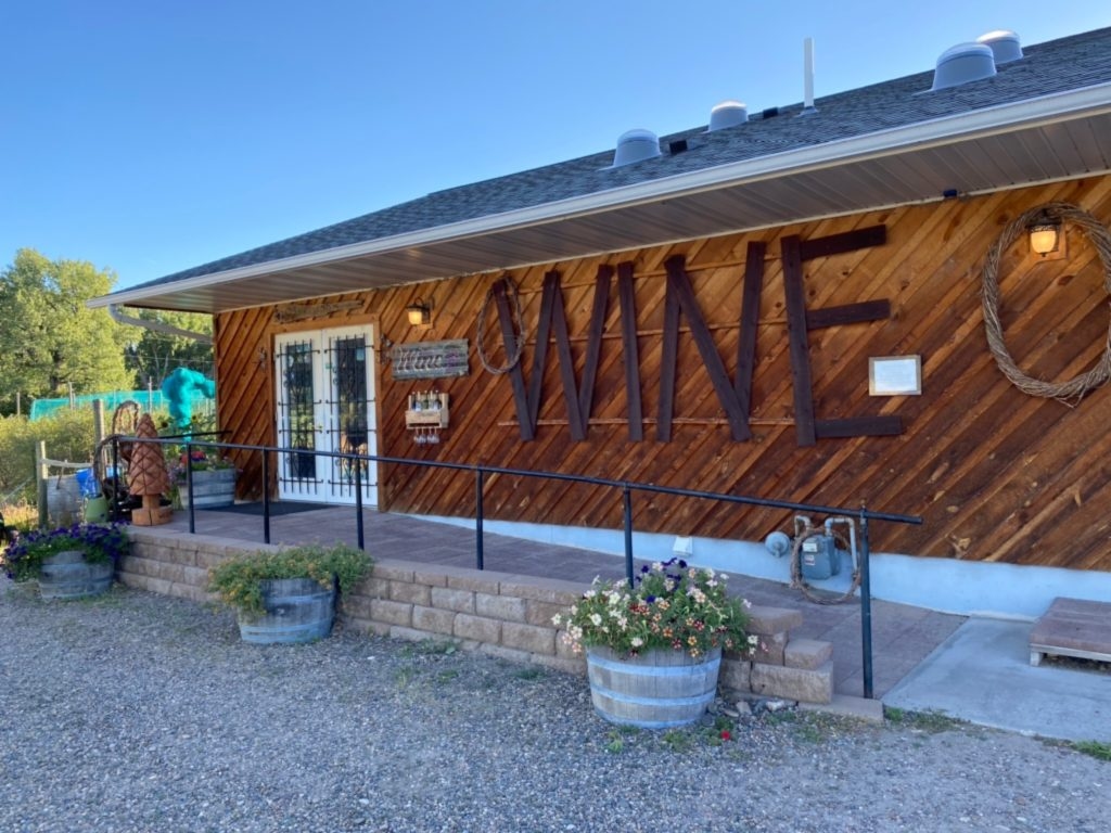 A winery sign leads the way to the Tongue River tasting room.