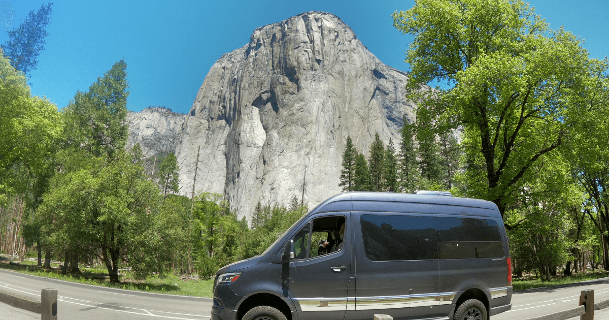Grech RV in front of mountain.