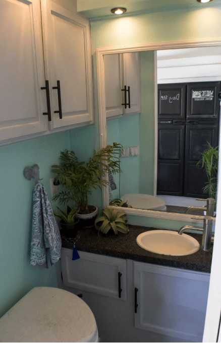 Update your bathroom's lighting to make a big impact on the space.