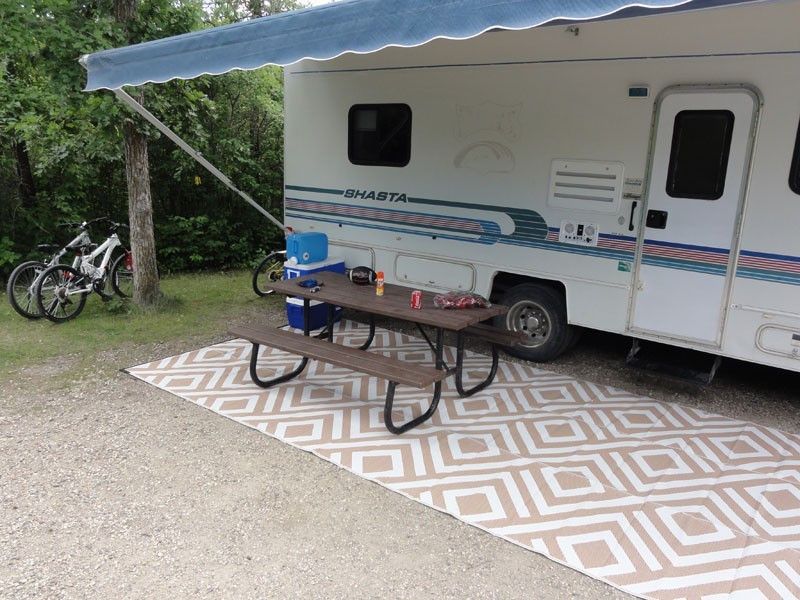 Add a table to your outdoor set-up for both aesthetics and functionality.
