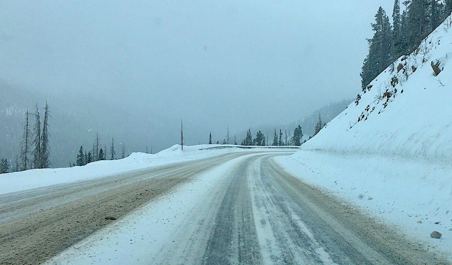 Icy and snowy roads can make for difficult driving conditions.
