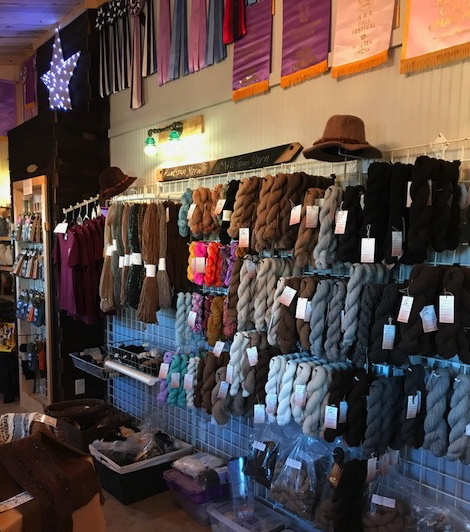 The on site store sells a variety of alpaca fiber products.